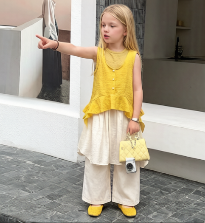 Three-piece set: sleeveless buttoned vest + skirt-pants (culottes)