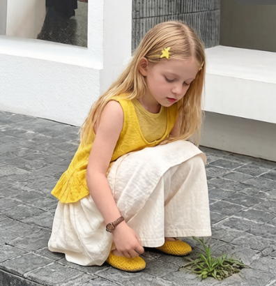Three-piece set: sleeveless buttoned vest + skirt-pants (culottes)