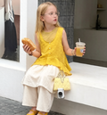 Three-piece set: sleeveless buttoned vest + skirt-pants (culottes)
